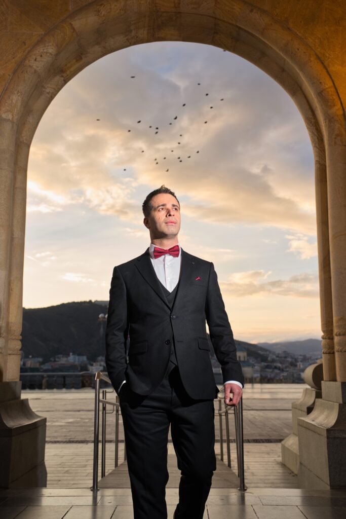 Wedding photograph (groom) taken at Holy Trinity Cathedral (Sameba) in Tbilisi by Artmakers Studio Wedding photograph (groom) taken at Holy Trinity Cathedral (Sameba) in Tbilisi by Artmakers Studio
